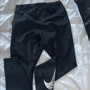 Nike Black Cropped Leggings with Patterned Swoosh